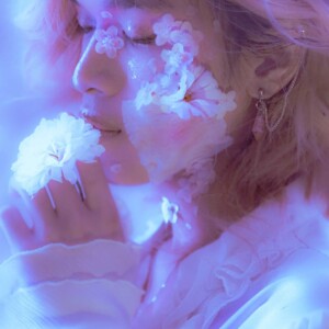 Dreamy Lighting and a Face Full of Flowers. Fantasy lighting with a face displayed with flowers